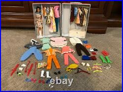 1960's Vintage Barbie doll, case lot of clothes and accessories