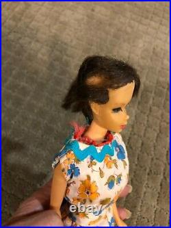 1960's Vintage Barbie doll, case lot of clothes and accessories