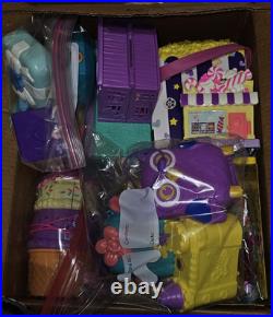 Polly Pocket Lot of 15 Play Sets including dolls and accessories. EUC