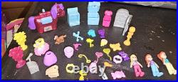 Polly Pocket Lot of 15 Play Sets including dolls and accessories. EUC
