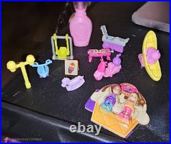 Polly Pocket Lot of 15 Play Sets including dolls and accessories. EUC